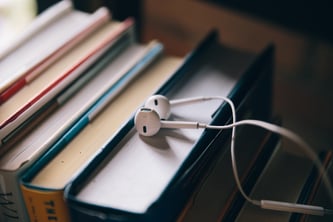 books and earbuds